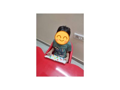 Child learning activity at IKUJI center